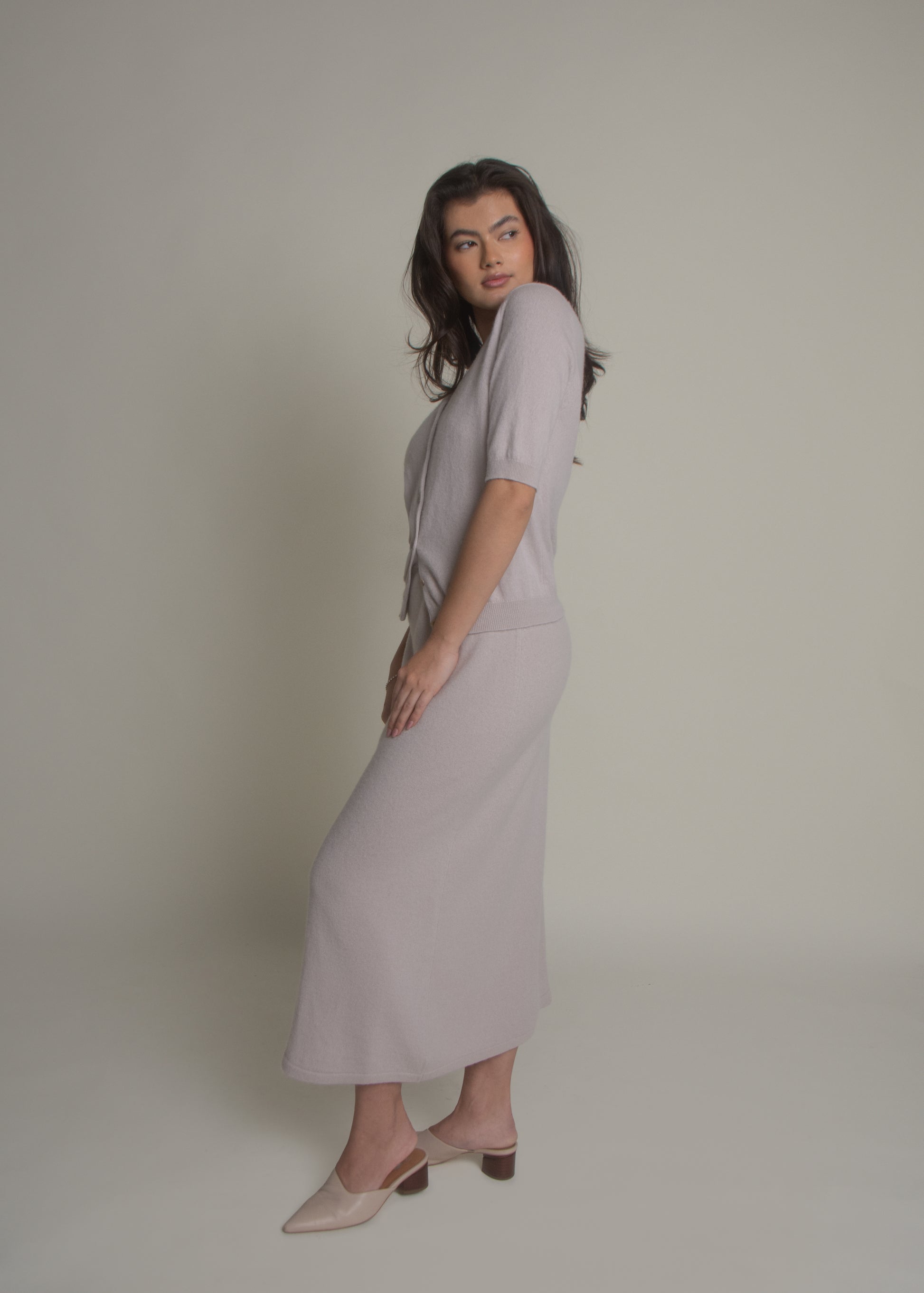 beige a-line cashmere skirt styled with matching knit top