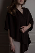 cashmere poncho side view draped 
silhouette Fiora Muse