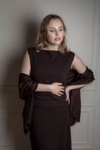 woman wearing brown cashmere scarf draped 
over shoulders