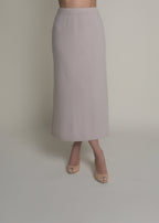 woman wearing beige a-line cashmere skirt front view