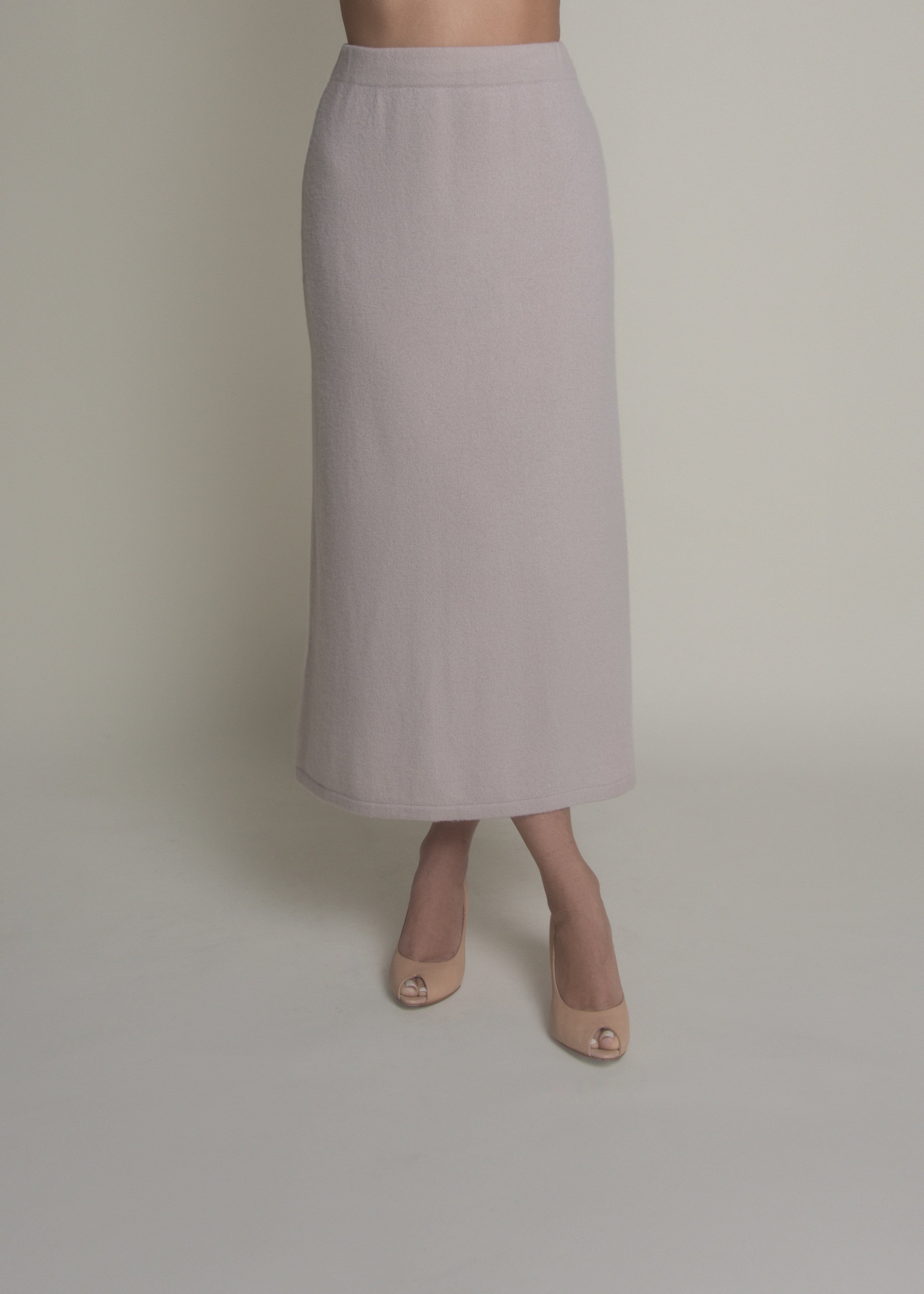 woman wearing beige a-line cashmere skirt front view