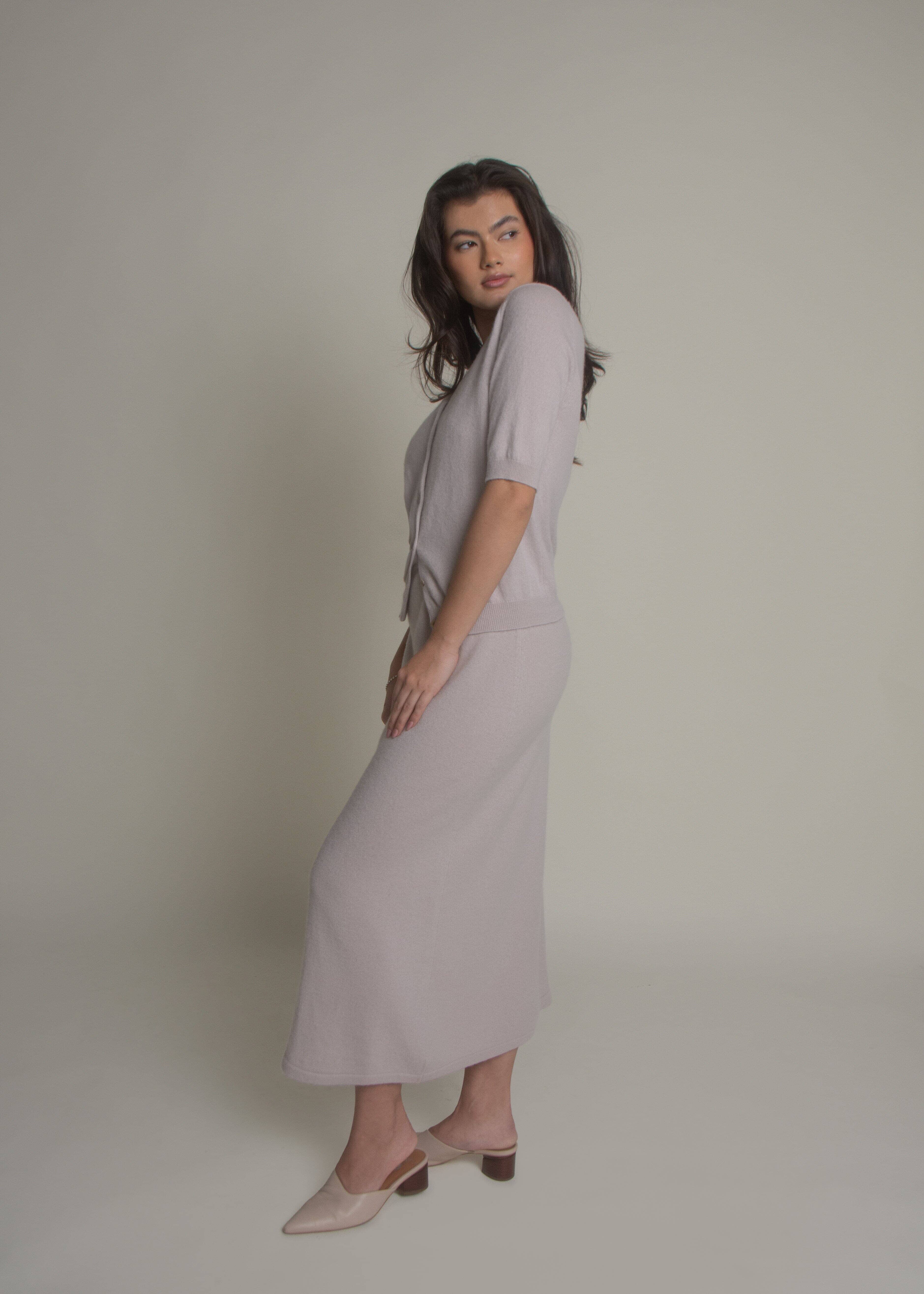 beige a-line cashmere skirt styled with matching knit top