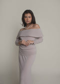 woman wearing beige off-shoulder cashmere sweater front view